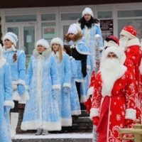Carnival procession of Santa Clauses and Snow Maidens